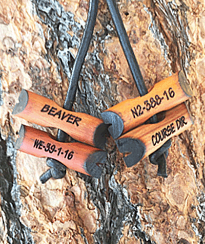Four Engraved Wood Badge Beads