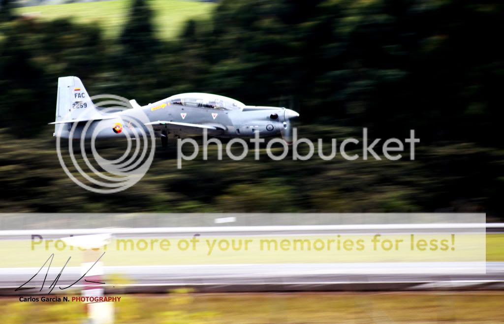 IMAGE: http://i919.photobucket.com/albums/ad35/surgeonhawkeye/F%20Air%202011/Fair20111088tucano2.jpg