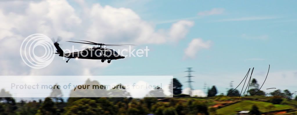 IMAGE: http://i919.photobucket.com/albums/ad35/surgeonhawkeye/F%20Air%202011/Fair20111649UH60paning.jpg