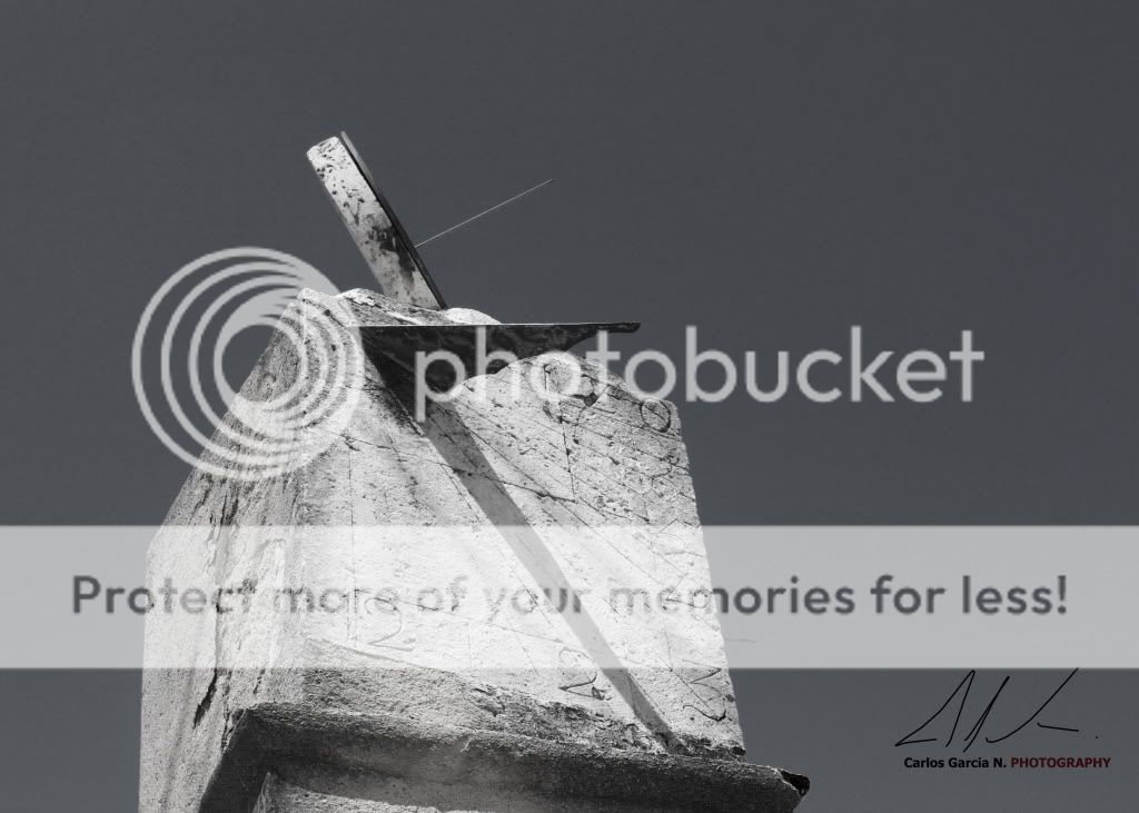 IMAGE: http://i919.photobucket.com/albums/ad35/surgeonhawkeye/Travel/SunclockBW.jpg